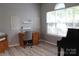 Cozy home office with light gray walls and a large window for natural light at 3092 S Legacy Park Blvd, Fort Mill, SC 29707
