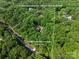 Secluded 5-acre lot at 3408 Sandalwood Lane offers wooded privacy, defining property boundaries with approximate lot lines at 3408 Sandalwood Ln, Waxhaw, NC 28173