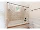 Tiled tub/shower with white trim at 3408 Sandalwood Ln, Waxhaw, NC 28173