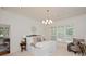 Bedroom with neutral tones, a large window, soft lighting, and an attached room at 3408 Sandalwood Ln, Waxhaw, NC 28173