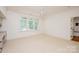 Spacious bedroom featuring neutral carpet, ceiling fan and natural light at 3408 Sandalwood Ln, Waxhaw, NC 28173