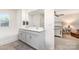 Bright bathroom boasts double vanity with white countertops and modern fixtures; a relaxing space at 3654 Azalea Ridge Dr, Mount Holly, NC 28102
