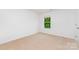 Simple bedroom with neutral carpet, creating a blank canvas at 3654 Azalea Ridge Dr, Mount Holly, NC 28102