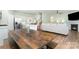 Open-concept dining area adjacent to kitchen and living room, perfect for seamless entertaining at 3654 Azalea Ridge Dr, Mount Holly, NC 28102
