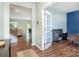 Inviting foyer with hardwood floors and an open view into the living room and office at 3654 Azalea Ridge Dr, Mount Holly, NC 28102