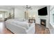 Inviting living room with a fireplace, ceiling fan, hardwood floors and comfortable seating arrangements at 3654 Azalea Ridge Dr, Mount Holly, NC 28102