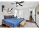 Relaxing bedroom with a comfy bed, bench, and a soothing ambiance enhanced by neutral tones at 3909 Woodbriar Trl, Charlotte, NC 28205