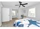 Bright and comfortable bedroom features natural light, desk area, and carpet at 3909 Woodbriar Trl, Charlotte, NC 28205