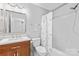 Bathroom featuring a wood vanity and a shower/tub combo at 4103 Christine Ln # E, Waxhaw, NC 28173