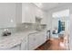 Modern kitchen featuring white cabinets, granite countertops, and stainless steel appliances at 4103 Christine Ln # E, Waxhaw, NC 28173