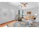 Bright living room with hardwood floors, neutral walls, and comfortable seating at 4103 Christine Ln # E, Waxhaw, NC 28173