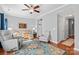 Comfortable living room with hardwood floors, neutral paint, and ample seating at 4103 Christine Ln # E, Waxhaw, NC 28173