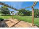 Spacious wooden back deck with pergola overlooking large grass filled backyard at 4507 Mackinac St, Charlotte, NC 28269