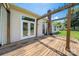 Wooden back deck with a pergola and glass paneled doors offering backyard views at 4507 Mackinac St, Charlotte, NC 28269