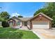 Charming single-story home with a brick facade and a well-manicured front lawn at 4507 Mackinac St, Charlotte, NC 28269