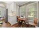Eat in kitchen with stainless steel refrigerator and lots of natural light from the window at 4507 Mackinac St, Charlotte, NC 28269