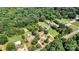 An aerial view showcasing the property's boundaries surrounded by lush greenery and scenic views at 4905 Grassy Creek Rd, Denver, NC 28037