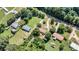 Aerial image showcasing the property among other homes and lush greenery at 4905 Grassy Creek Rd, Denver, NC 28037