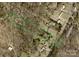 Aerial view of the property with a green boundary line, highlighting land and proximity to Grassy Creek Rd at 4905 Grassy Creek Rd, Denver, NC 28037