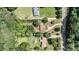 Aerial view outlining the property and the surrounding area with nearby roads and lush greenery at 4905 Grassy Creek Rd, Denver, NC 28037