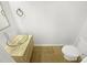 Half bathroom features a bowl sink, tile flooring, and modern fixtures at 5163 Ficus Tree Ln, Charlotte, NC 28215