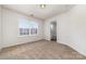 Inviting bedroom showcases soft carpeting, natural light through the window, and an ensuite bathroom at 5233 Halverson Ct, Kannapolis, NC 28083