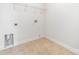 Clean and functional laundry room featuring tile flooring and essential hookups for washer and dryer at 5233 Halverson Ct, Kannapolis, NC 28083