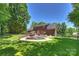 Spacious backyard features a pool, patio, and lush green lawn, perfect for outdoor entertaining at 6309 Chamar Cir, Kannapolis, NC 28081