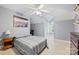 Comfortable bedroom with neutral colored walls, a large bed and a window offering natural light at 6309 Chamar Cir, Kannapolis, NC 28081