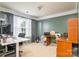 Home office space with large window at 7737 Pleasant Valley Dr, Harrisburg, NC 28075