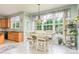 Open Kitchen includes a dining area with large windows at 7737 Pleasant Valley Dr, Harrisburg, NC 28075