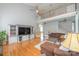 Spacious living room with wood floors and vaulted ceilings with views of the second story at 7737 Pleasant Valley Dr, Harrisburg, NC 28075