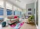 Relaxing sun room with neutral furnishings and lots of natural light at 8918 Cotton Press Rd, Charlotte, NC 28277