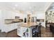 Well-equipped kitchen with a large island, pendant lighting, and stainless steel appliances at 101 Cross Current Ln, Belmont, NC 28012