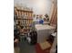 A laundry room features a washer, a dryer, and storage shelves at 111 Redwood Ln, Gastonia, NC 28052
