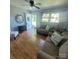 Cozy living room with hardwood floors, neutral colors, and ample natural light at 111 Redwood Ln, Gastonia, NC 28052