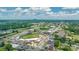 Panoramic aerial view showcasing a baseball stadium, tree-lined streets, and the city skyline at 1113 W 4Th Ave, Gastonia, NC 28052
