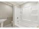 Bathroom with modern white fixtures and tub/shower combo at 1113 W 4Th Ave, Gastonia, NC 28052