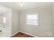 Bedroom with view of bathroom at 1113 W 4Th Ave, Gastonia, NC 28052