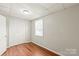 Bedroom with double closet, wood laminate flooring and natural light at 1113 W 4Th Ave, Gastonia, NC 28052