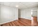 Bedroom with wood laminate flooring, closet and doors at 1113 W 4Th Ave, Gastonia, NC 28052