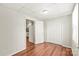 Bedroom featuring closet and doorway to kitchen at 1113 W 4Th Ave, Gastonia, NC 28052