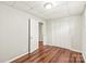 Bedroom featuring closet and doorway leading to bathroom at 1113 W 4Th Ave, Gastonia, NC 28052