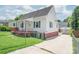Cozy home with well maintained lawn, convenient driveway, and lovely exterior, awaiting your personal touch at 1113 W 4Th Ave, Gastonia, NC 28052