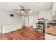 Bright kitchen features stainless steel appliances and white cabinets at 1113 W 4Th Ave, Gastonia, NC 28052