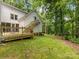 Enjoy the spacious deck, stairs, and backyard, perfect for outdoor entertaining and relaxation at 1119 Holleybank Dr, Matthews, NC 28105