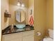 Powder room with vessel sink and unique granite countertop at 1119 Holleybank Dr, Matthews, NC 28105