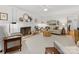 Bright living room with fireplace, plush seating, and elegant decor throughout the living space at 1119 Holleybank Dr, Matthews, NC 28105