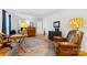 Cozy office space with hardwood floors, an area rug, comfortable leather chair, and functional desk at 1119 Holleybank Dr, Matthews, NC 28105