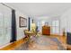 Comfortable office space with hardwood floors, an area rug, and ample natural light at 1119 Holleybank Dr, Matthews, NC 28105